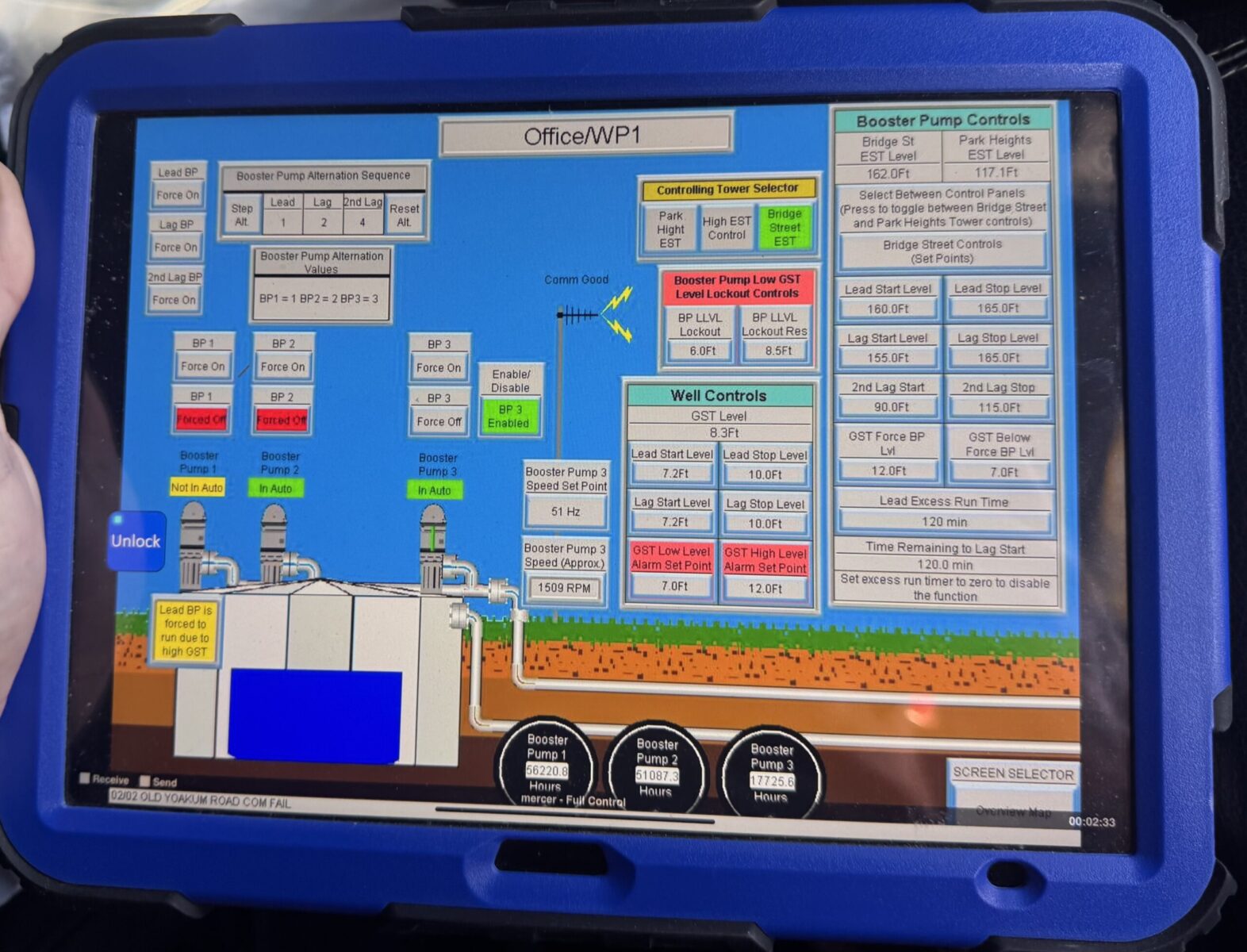 Operator viewing a Mercer Controls SCADA screen on a tablet in the field