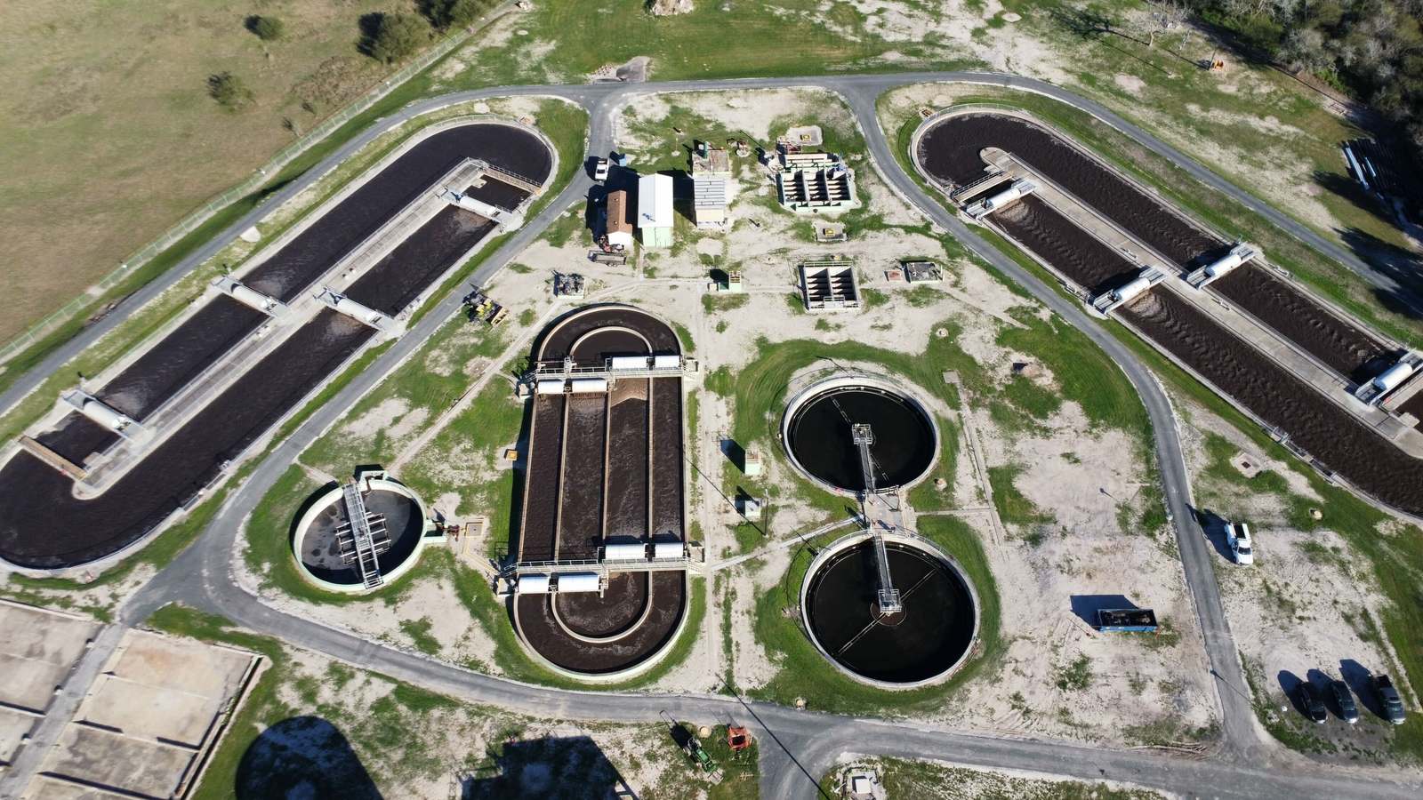 Aerial view of clarifiers and treatment basins at a Texas water facility