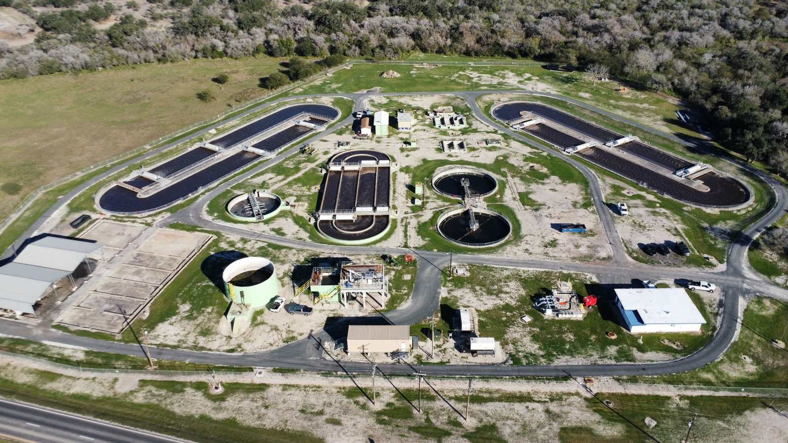 Drone view of oxidation ditches and clarifiers at a Texas wastewater treatment plant