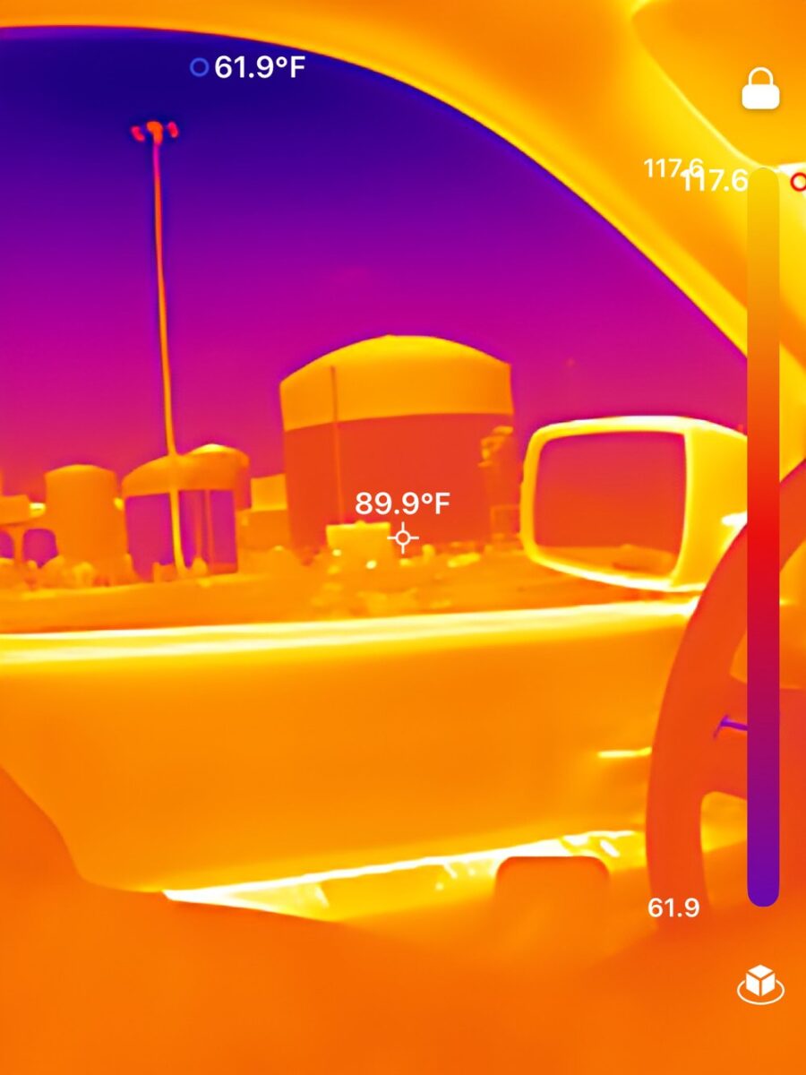 Thermal imaging inspection of electrical equipment showing temperature readings