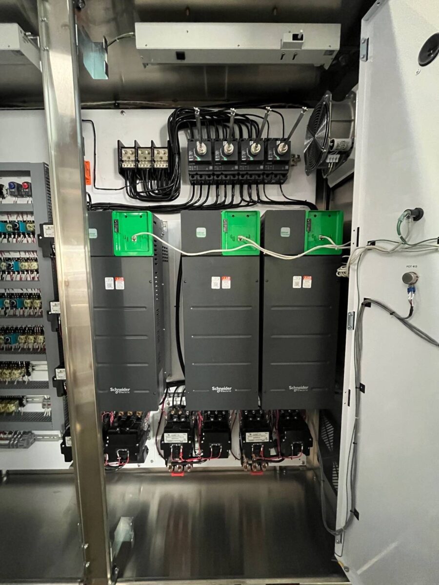 Variable frequency drives mounted inside a Mercer Controls motor control panel
